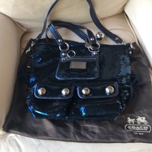 Signature Coach Bag. Collectors item slightly used